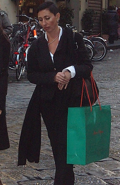 White shirt with a black winter jacket and black scarf