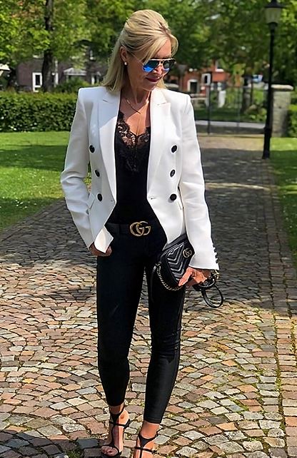 Double-breasted white jacket with black accents