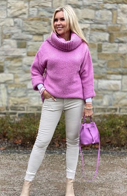 Pink turtleneck sweater with a slimming effect