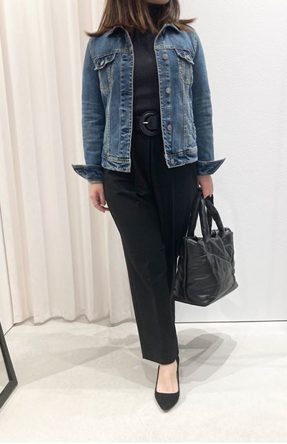 Denim jacket with high-waisted black pants