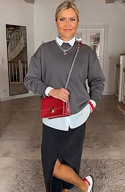 Gray sweater with white shirt and red accent accessories