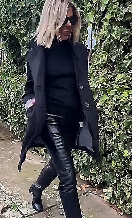Winter outfit with black innerwear and leather pants